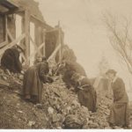 Mignon Talbot and others sorting through rubble