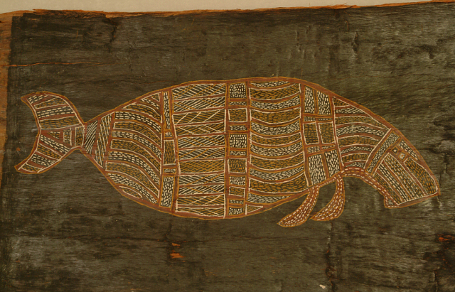 Bark painting of a dugong done with red, white, and yellow pigments. 