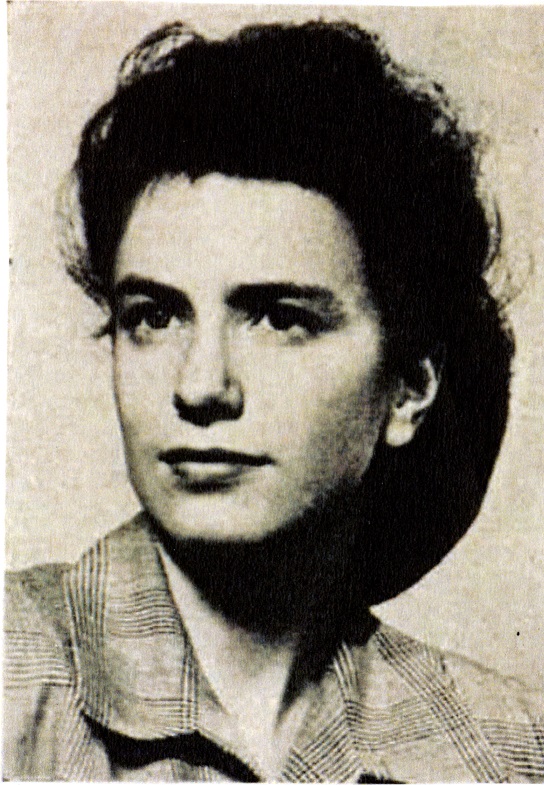 Headshot of Barbara Passe, a young pale woman with think black hair pulled back.