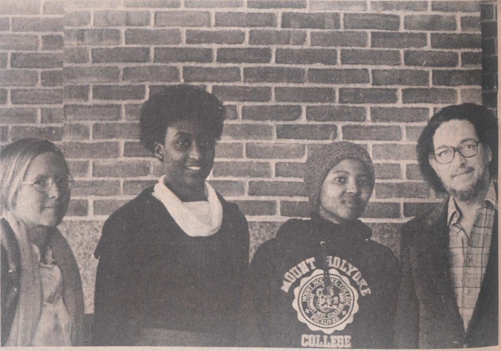 L-R: Prof. Barbara Brown, Valerie Atkins, class of 1981, and Nomvuyo Qubaka (South Africa), class of 1983, with distinguished South African poet and revolutionary Dennis Brutus, who visited Mount Holyoke in 1980.