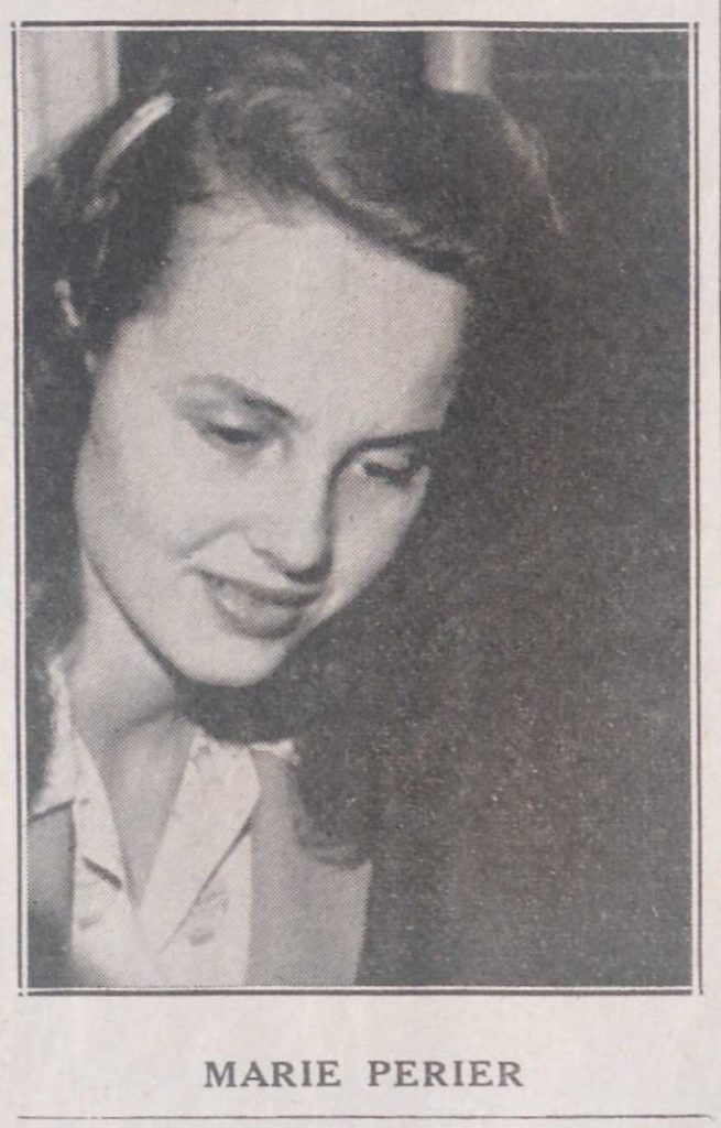 Headshot of Marie Périer with a smile and downcast eyes.