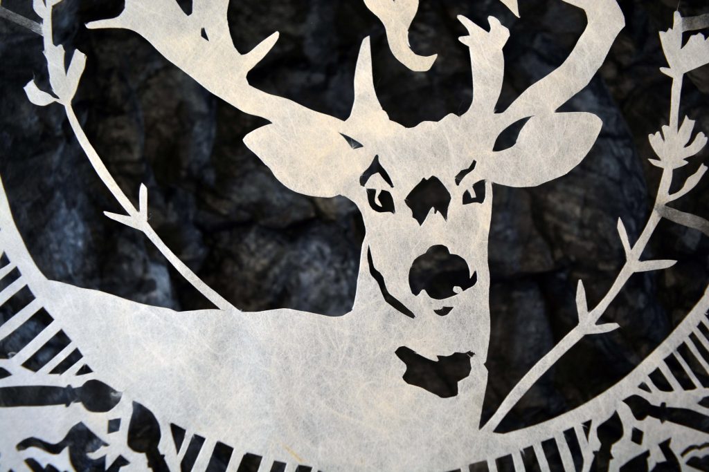 detail image of Japanese kozo paper cut out into the shape of a deer