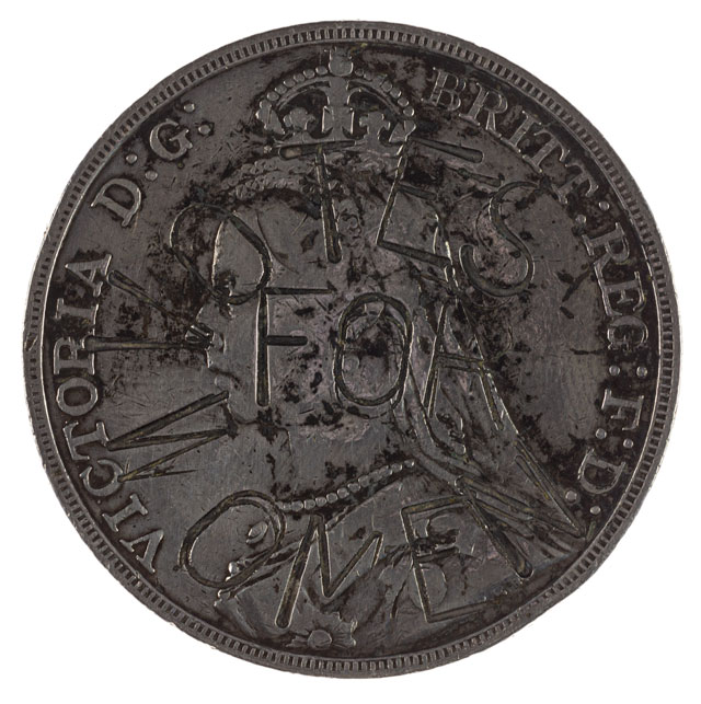 Queen Victoria’s portrait is on the obverse of this coin, with the words, ‘Votes for Women’ stamped across her head