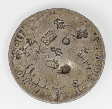 silver coin with bust of Carlos (Charles) IV facing right with various South and/or East Asian merchant chopmarks; CAROLUS IIII DEI GRATIA 1791
