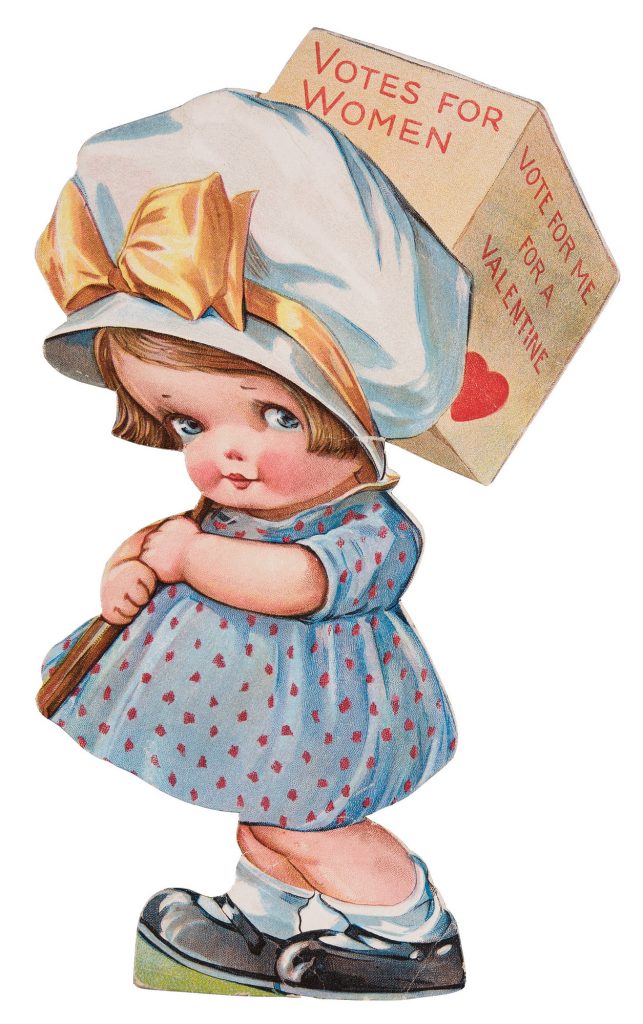 An illustration of a cherubic little girl dressed in a blue dress with red polka dots looks up from under her lashes. She holds the wooden handle of a cube-shaped sign in two chubby fists and braces it against her left shoulder. On the sign’s two visible panels is written “Votes for Women” and “Vote for me for a Valentine” in red text, with a heart below the latter. Her large white bonnet tied with a yellow ribbon masks the lower portion of the sign. Her torso is angled slightly toward the viewer but her feet, in black Mary Jane shoes and white socks, point left, as if she is in the midst of marching.